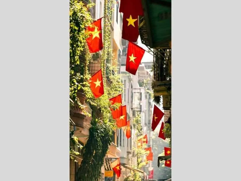 Hình nền 30/4 1/5 lá cờ đỏ sao vàng cho ngày vui chiến thắng